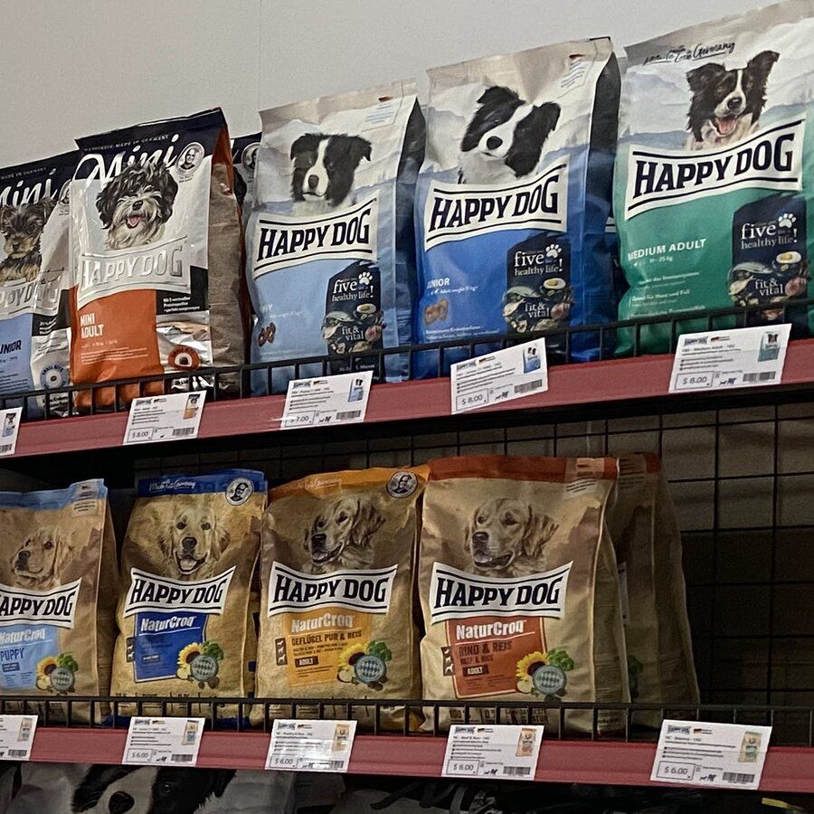 Happy Dog food bags on the shelf in the Cambovet pet store