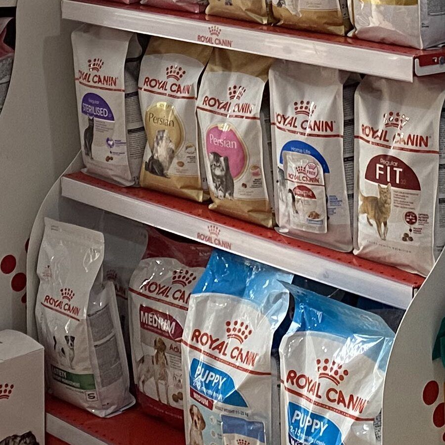 Royal Canin dog food bags on the shelf in the Cambovet pet store